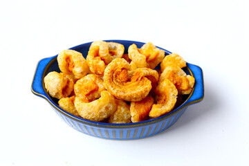 Crispy pork cracklings, a crunchy savory snack.