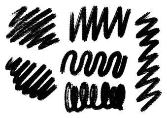 Various hand-drawn black scribbles and brush stroke textures on a white background