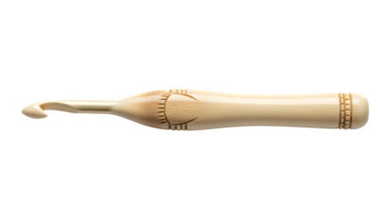 Closeup of a vintage crochet hook with decorative carvings, a tool for creating handmade textiles, isolated on transparent background