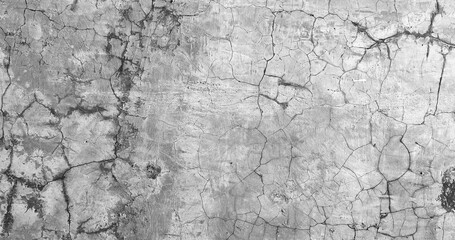 A textured old wall with a weathered and cracked grunge pattern