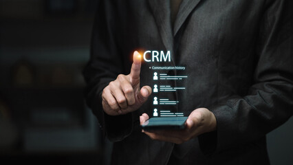 Businessman Using Smartphone with CRM System for Customer Relationship Management and Analytics