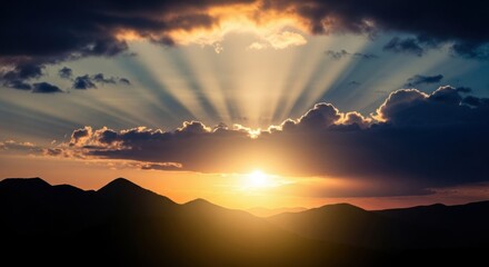 Majestic Sunset Over Silhouetted Mountains With Dramatic Rays of Light
