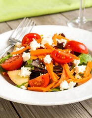 Fresh salad with vegetables and cheese