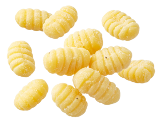 Fresh uncooked gnocchi pasta isolated, showing classic ridged texture, handmade appearance, and dusted with flour on a white background.