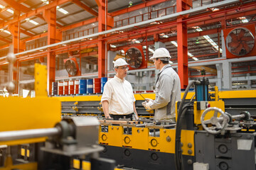 Manufacturing dialogue between engineers factory floor industrial interaction modern workspace eye-level collaboration insights