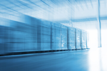 Blurred Warehouse Space for Logistics Industry. Storage Warehouse. Bulk of Package Boxes Supplies. Supply Chain Shipment Goods. Distribution Warehouse Shipping, Logistics 
