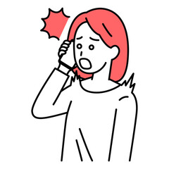 スマートフォンでの通話で驚く若い女性