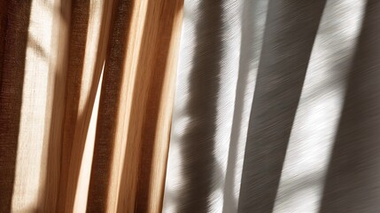 Soft sunlight filtering through wooden slats casting striped shadows on fabric curtain, creating textured pattern and negative space, ideal for minimal background, interior design, home decor concepts