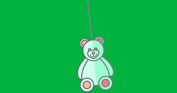 Mint-green teddy bear hanging from vertical zipper in apparel design with transparent background