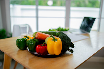 Woman enjoying fresh organic salad with lettuce, tomato, and carrot, highlighting healthy eating, vegetarian lifestyle, and balanced nutrition.
