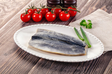 Salted herring fillet with skin