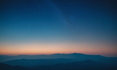Fototapeta premium Stunning mountain silhouette under vast starry night sky, a serene twilight gradient.