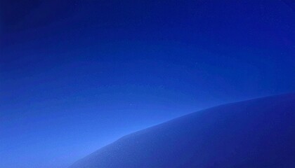 Vibrant gradient of deep blue hues fading into lighter tones, creating a serene and abstract background.