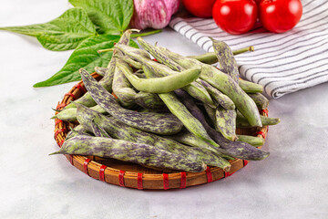 Raw green bean strips heap