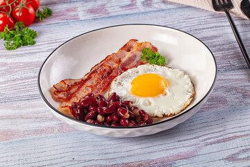 English breakfast with egg, bean and bacon