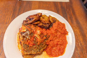 Grilled fish with Tomato Pepper stew and Plantain