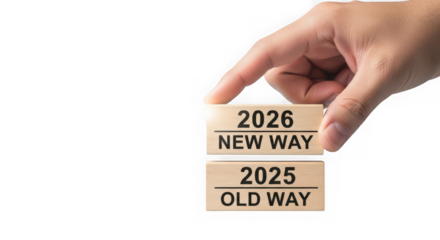 Hand stacking wooden blocks showing 2026 new way on top of 2025 old way isolated on transparent background