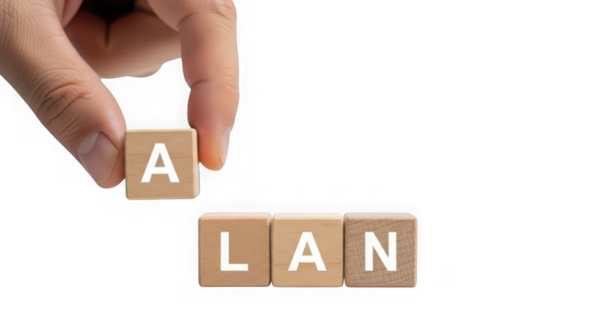 Hand placing a wooden cube with the letter a to complete the word plan made of blocks isolated on transparent background
