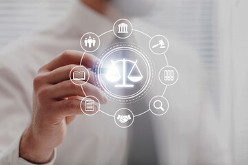 Fototapeta premium Legal Professional Justice Icons in businessman hand