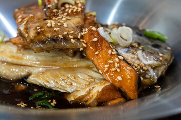 salmon braised with soy sauce and vegetable