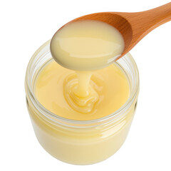 Creamy yellow substance on a wooden spoon scooped from a jar isolated on transparent background
