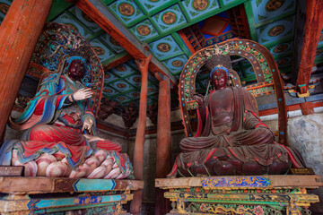 Fototapeta premium Painted Buddha statues at Shuanglin Temple in Pingyao County, Jinzhong City, Shanxi Province