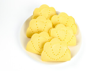 Handmade Yellow Lotus Leaf Shaped Cookies Cakes on White Plate Asian Dessert Food Photography