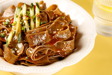 Chinese Buckwheat Noodles with Sauce and Cucumber Garnish - Traditional Shaanxi Cuisine