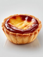 Fototapeta premium Sweet Tart: Indulge your senses with a macro shot of a delectable egg tart, showcasing a flaky crust and creamy custard filling, offering a tempting treat for all.