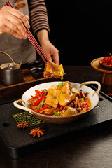 Traditional Chinese Braised Meat Dish with Chopsticks - Asian Cuisine Cooking