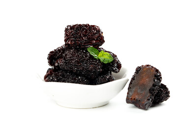 Dried Chinese Jujube Dates with Mint in White Bowl on White Background