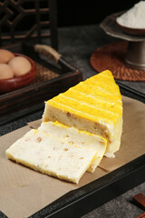 Hubei Specialty Layered Cake Traditional Chinese Handmade Dessert Being Sliced Golden Yellow