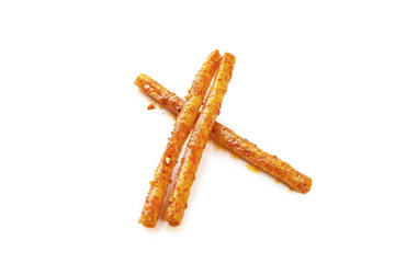 Handmade Spicy Beef Tendon Sticks - Dried Chili Seasoned Meat Snack Chips on White Background