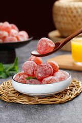 Candied Kumquat Fruits with Sugar Coating in Bowl - Traditional Preserved Citrus Confection
