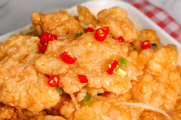 Crispy Golden Fried Pork with Chili Peppers - Traditional Asian Cuisine Dish