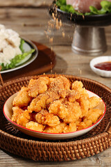 Korean Fried Chicken Wings and Legs with Salt Seasoning on Wicker Platter - Golden Crispy Snack Food