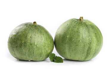 Fresh Green Melons from Shandong China on White Background with Mint Leaves