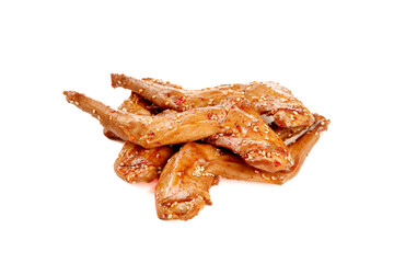 Spicy Glazed Rabbit Legs with Sesame Seeds and Chili Flakes on White Background
