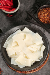 Traditional Handmade Noodle Sheets Henan Style Chinese Cuisine with Chilies and Spices