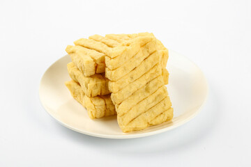 Dried Tofu Skewers on White Plate - Traditional Henan Asian Vegetarian Protein Food Ingredient