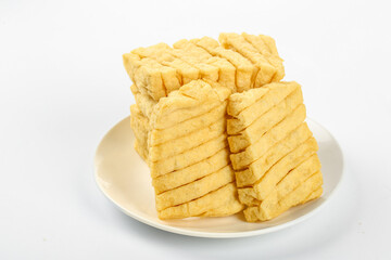Fresh Sliced Tofu on White Plate - Traditional Asian Vegetarian Protein Ingredient
