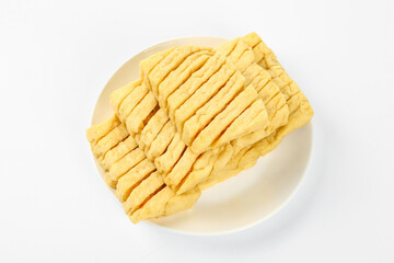 Dried Bean Curd Sticks Tofu Skin on White Plate Traditional Asian Ingredient