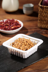 Japanese Natto Fermented Soybeans in Container Traditional Asian Food Setup