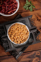 Japanese natto fermented soybeans with chopsticks on bamboo mat traditional Asian healthy food