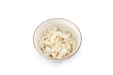 Dried White Lily Bulb Scales in Bowl - Traditional Chinese Herbal Medicine Ingredient