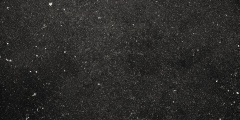 Dark gray surface resembling an old chalkboard or a heavily scratched in a textured wall, with numerous fine white scratches, scuff marks, and speckles, giving it a textured, aged appearance.