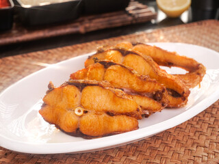 Special Smoked Fish Fillets on White Plate - Shanghai Style Asian Cuisine Delicacy