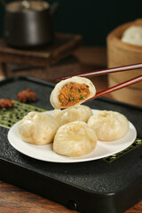 Traditional Chinese Xiaolongbao Soup Dumplings with Chopsticks - Authentic Asian Cuisine