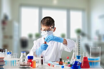 Little child make chemistry science experimental chemistry lessons.