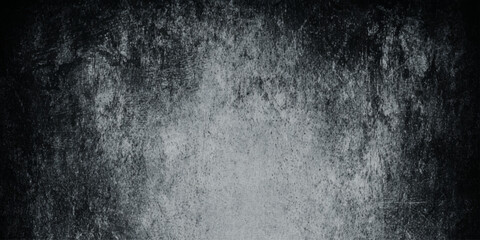 Dark gray surface resembling an old chalkboard or a heavily scratched in a textured wall, with numerous fine white scratches, scuff marks, and speckles, giving it a textured, aged appearance.